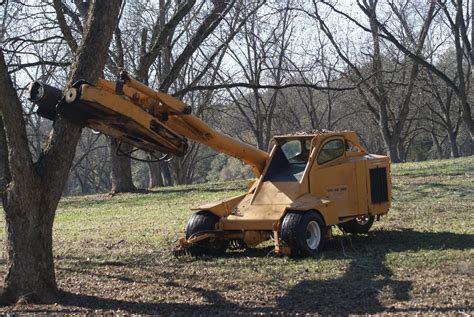 pecan tree shaker for skid steer|pecan machinery.